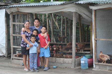Family with chickens 